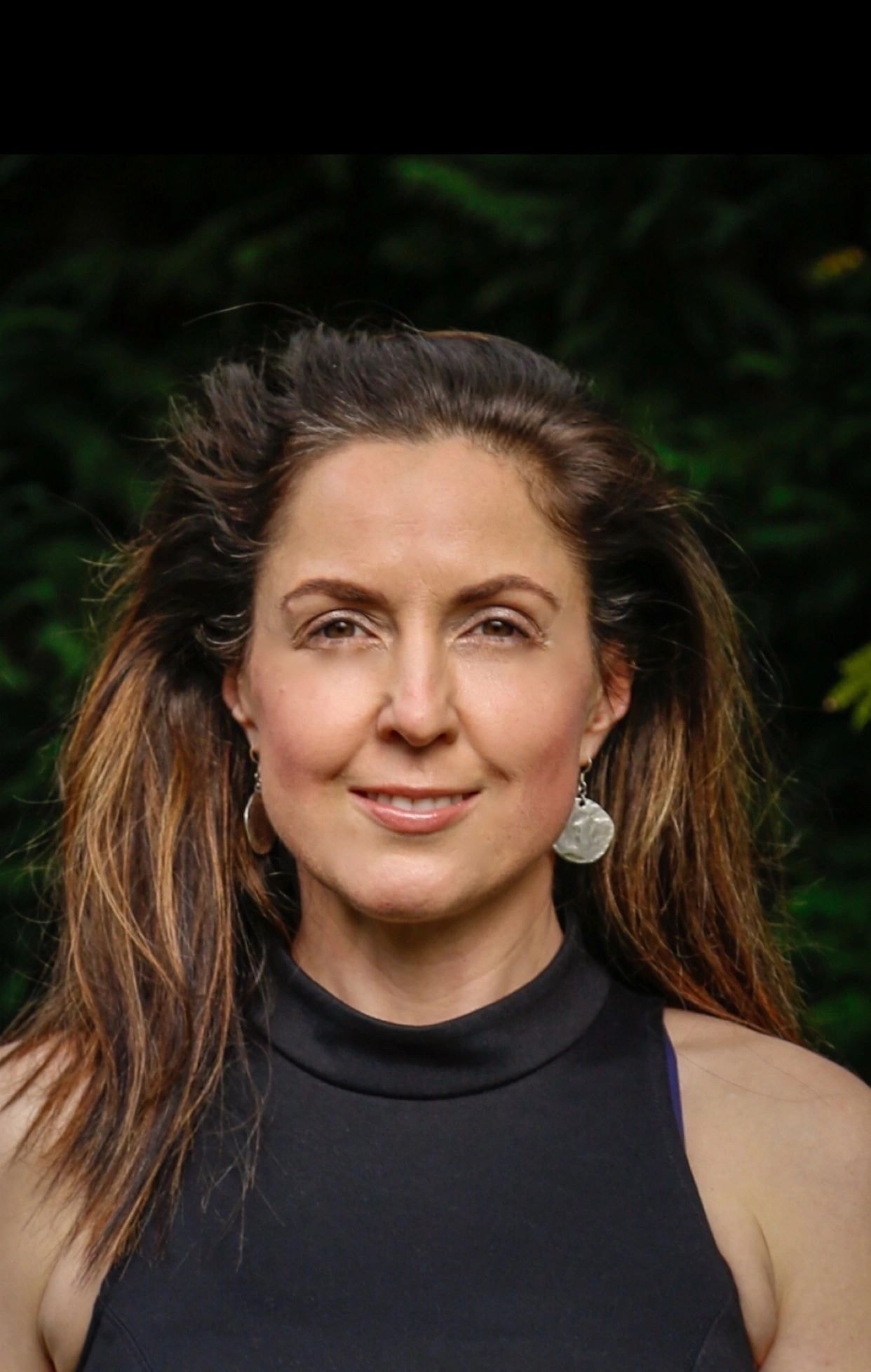 Carmel, metaphysical healer and founder of Aster Healing